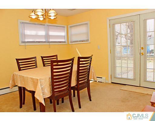 166 Winthrop Road Edison, NJ 08817 - Photo 9 of 17 a dining room with furniture and a window