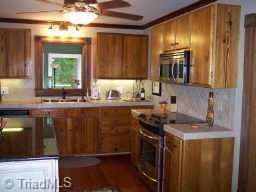 490 River Ridge Lane Lexington, NC 27295 - Photo 2 of 9 Other. Keeping Room with Gourmet Kitchen featuring new Stainless Steel Appliances