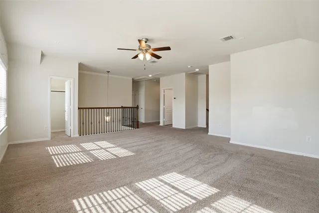 a view of a livingroom with a staircase