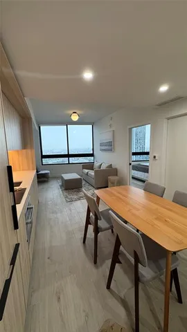 a workspace with furniture and window