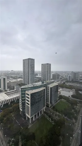 a view of roof with city view