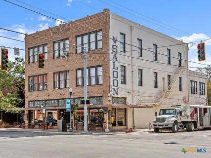 a view of a building and a street