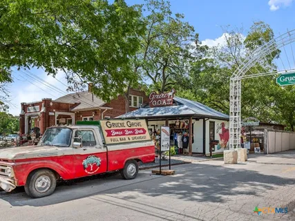 a front view of a house with parking space