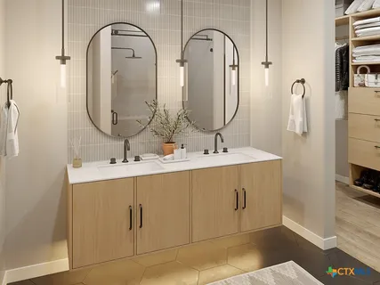 a bathroom with a double vanity sink and a mirror