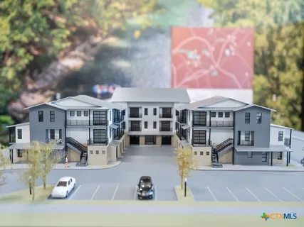 a front view of a building with street view