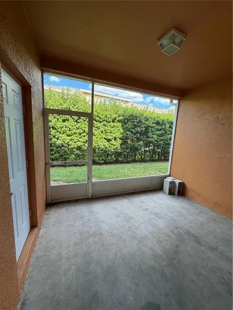 a view of room with a large window