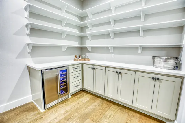 a utility room with cabinets