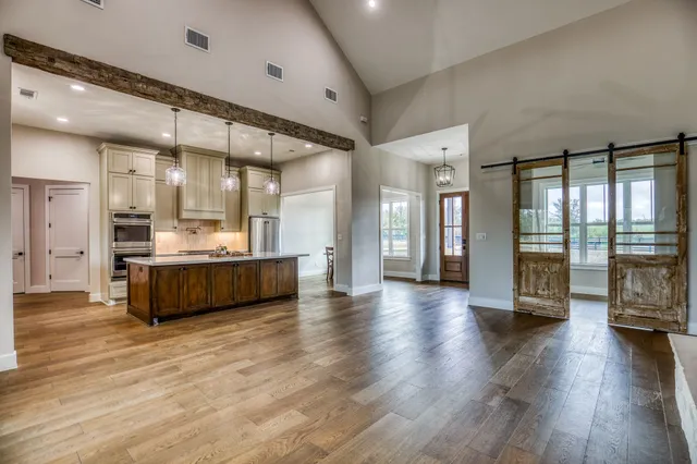 a bathroom with a sink and a large mirror