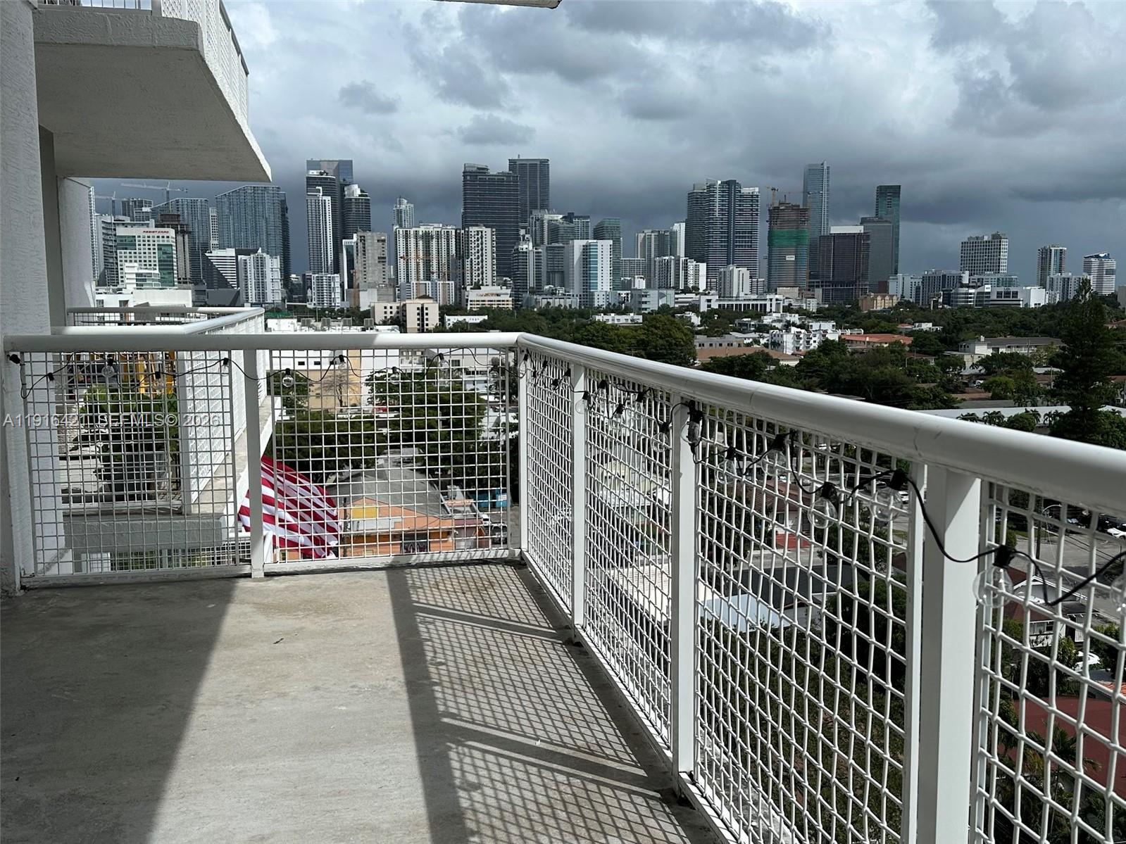 900 Southwest 8th Street, Unit 1010 Miami, FL 33130 - Photo 14 of 27 a view of a balcony with city view
