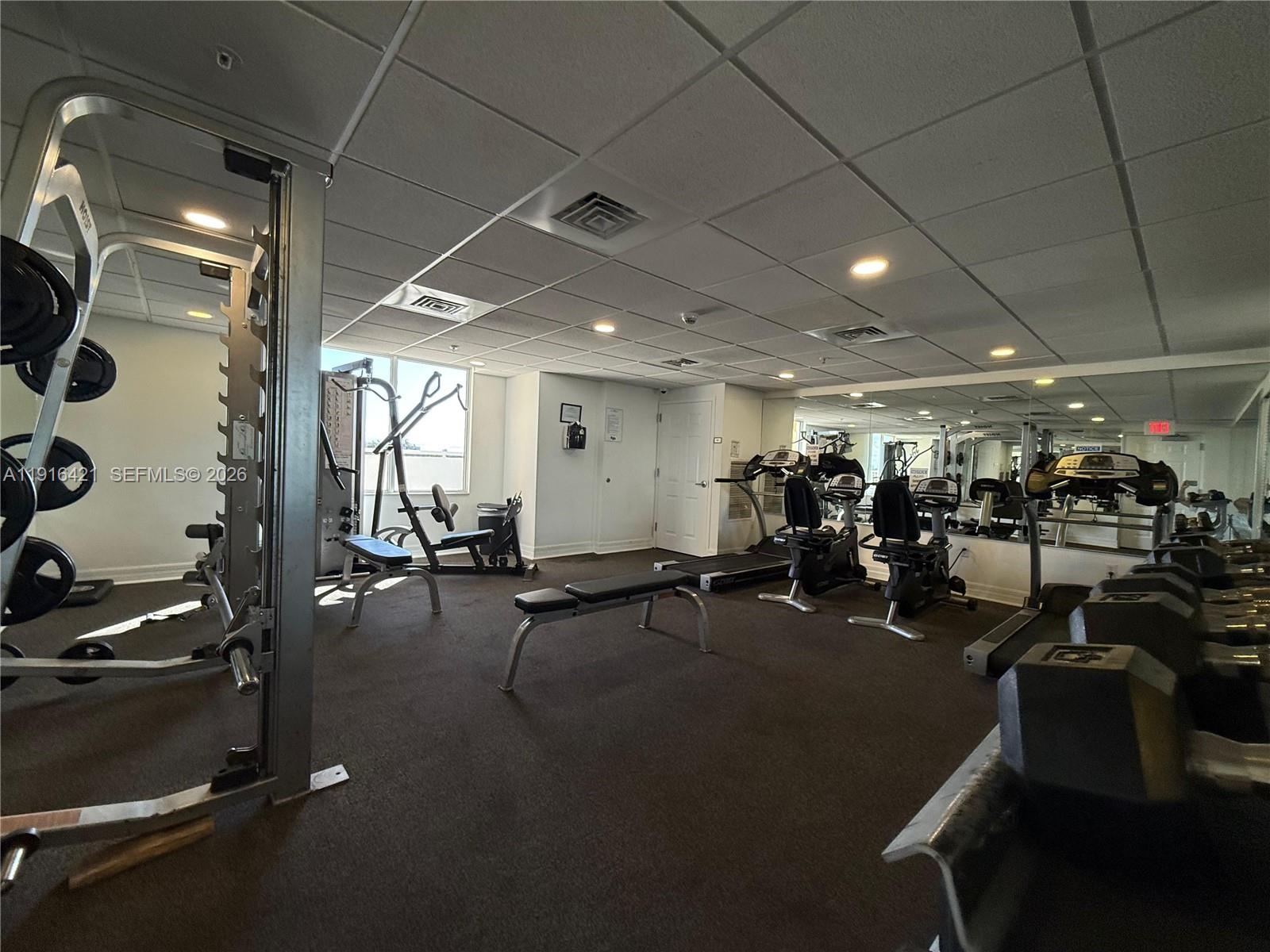 900 Southwest 8th Street, Unit 1010 Miami, FL 33130 - Photo 26 of 27 a view of a room with gym equipment