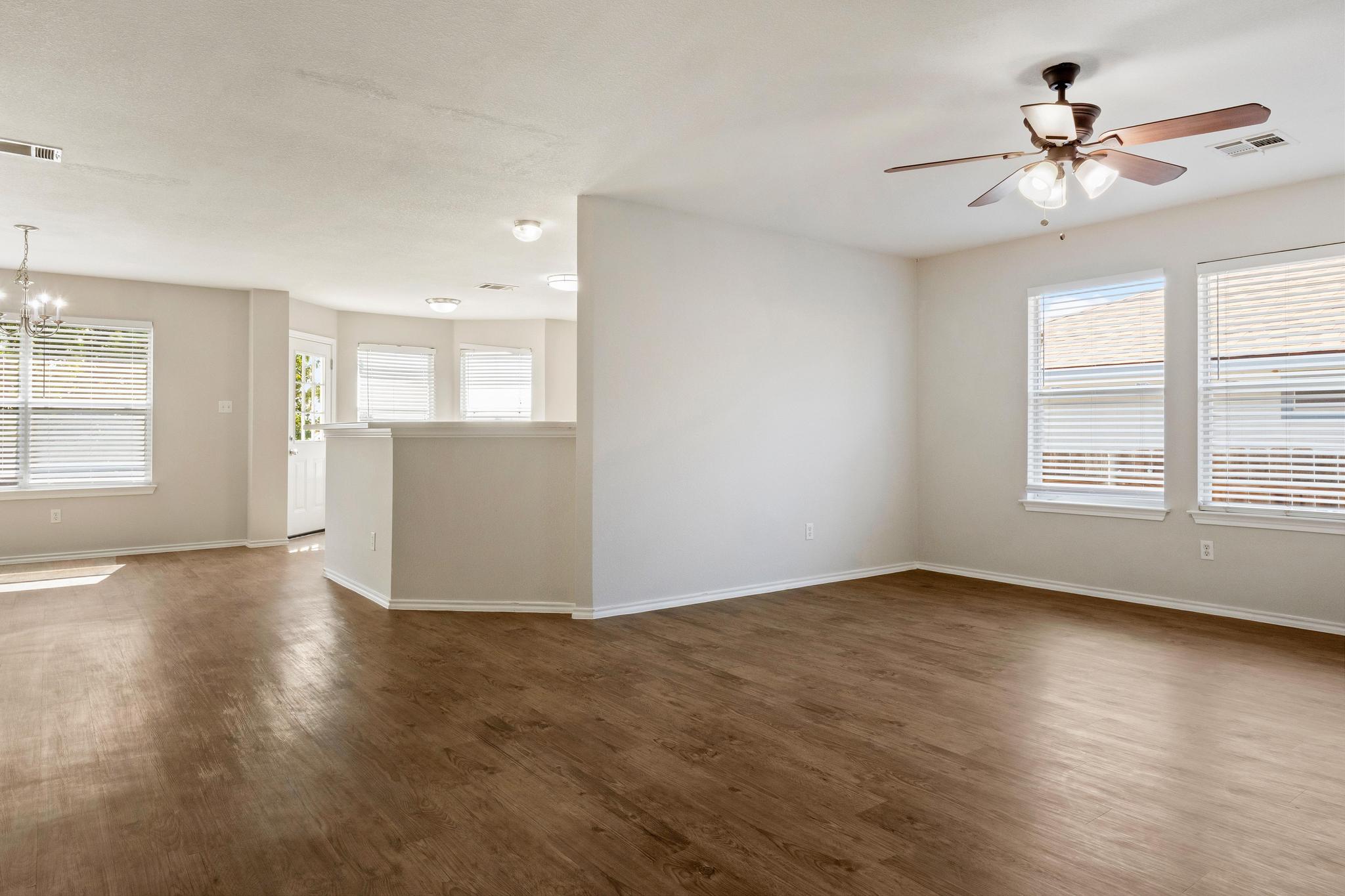 162 Brandons Way Buda, TX 78610 - Photo 21 of 36 a view of an empty room with a window