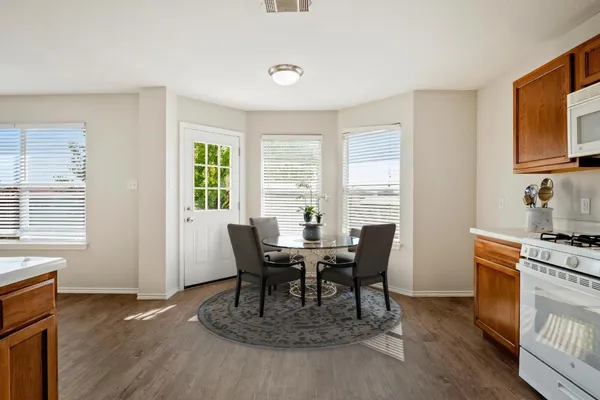 a view of a dining room with furniture window and outside view
