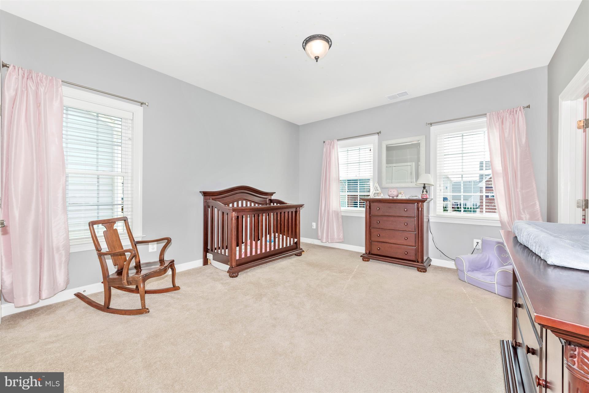 9158 Bealls Farm Road Frederick, MD 21704 - Photo 20 of 30 a living room with furniture and a window