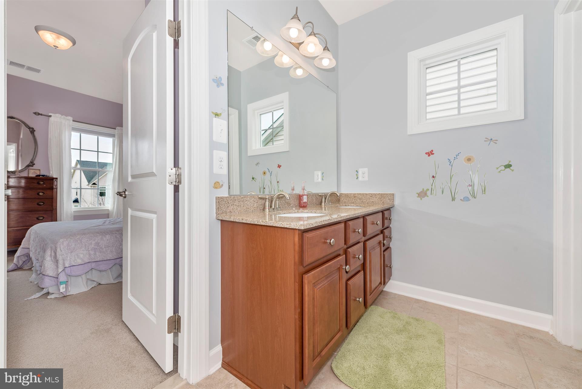 9158 Bealls Farm Road Frederick, MD 21704 - Photo 21 of 30 a bathroom with a sink double vanity and a mirror