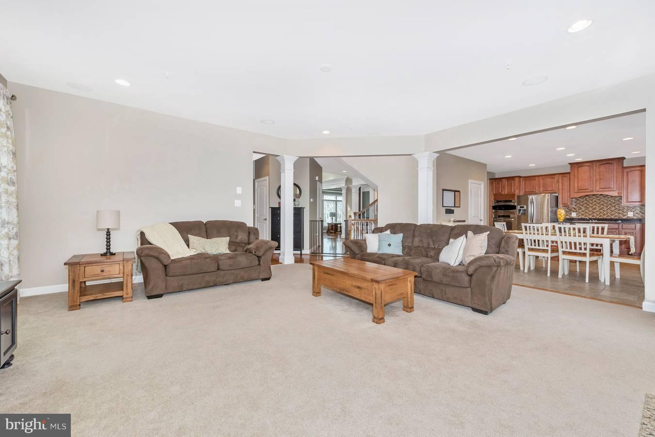 9158 Bealls Farm Road Frederick, MD 21704 - Photo 10 of 30 a living room with furniture and a table