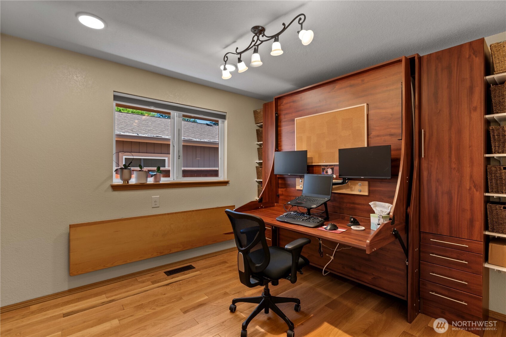 121 Benton Street Leavenworth, WA 98826 - Photo 20 of 37 a view of a workspace with furniture and a window