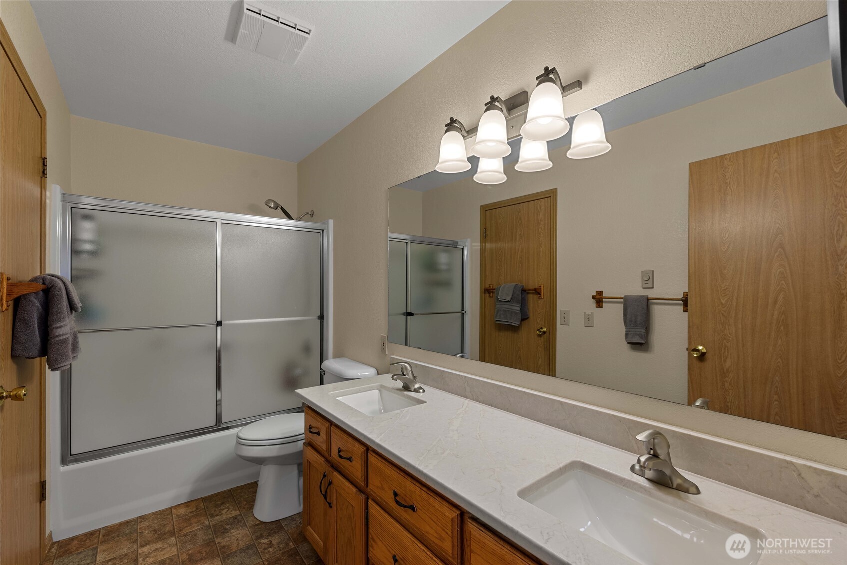 121 Benton Street Leavenworth, WA 98826 - Photo 21 of 37 a bathroom with a sink toilet and shower