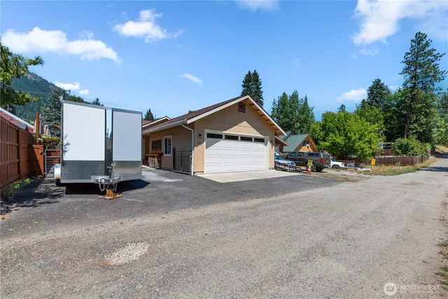 a view of street with parked cars