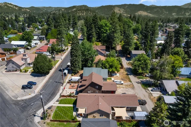 an aerial view of house with yard