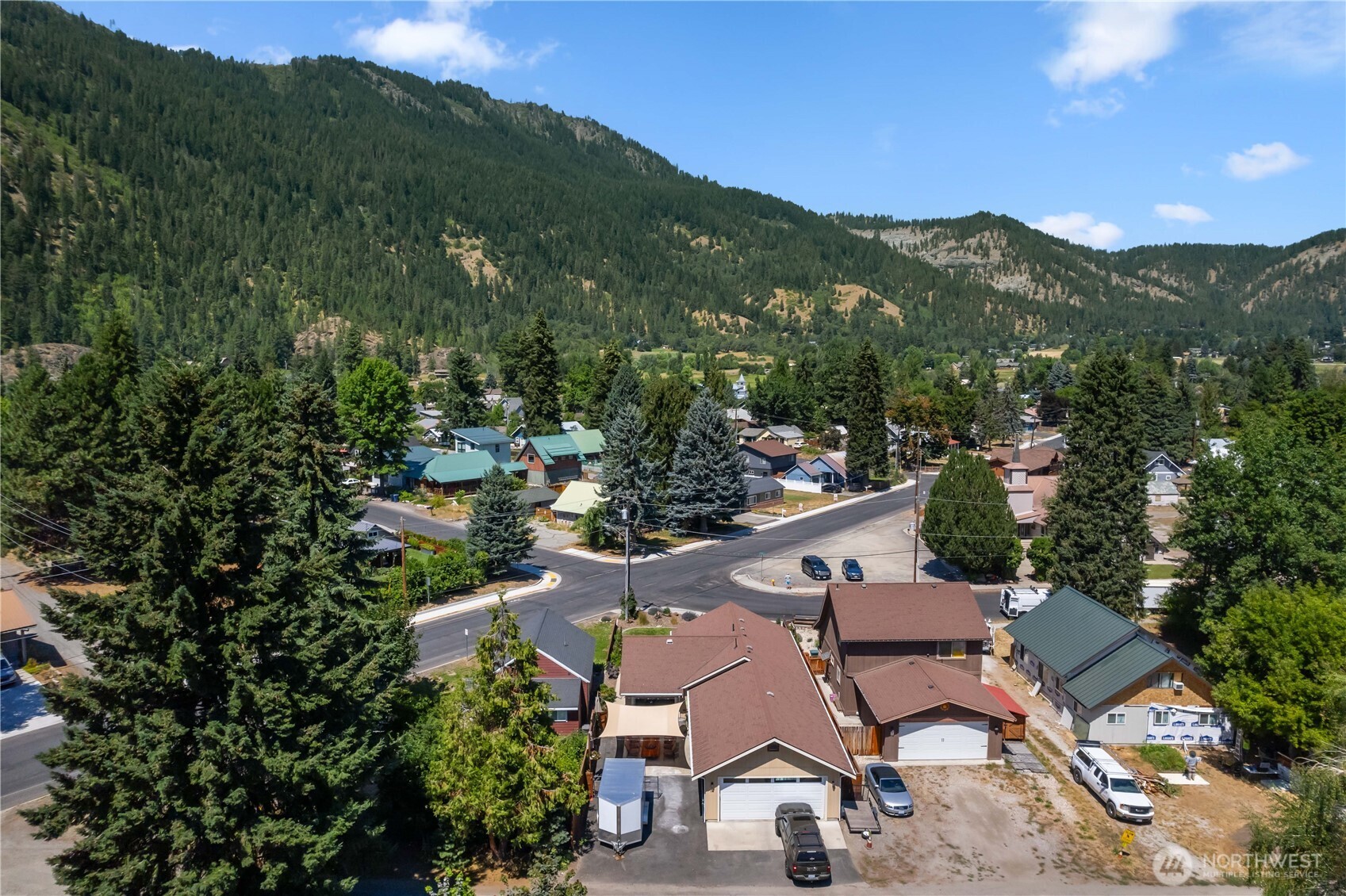 121 Benton Street Leavenworth, WA 98826 - Photo 36 of 37 a view of a patio with a table under an umbrella