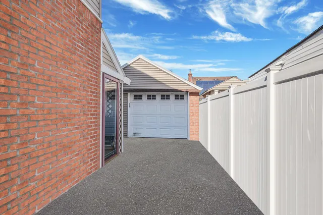 a yellow house with outdoor space