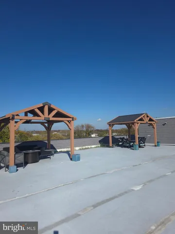 a view of a car parked in the parking lot