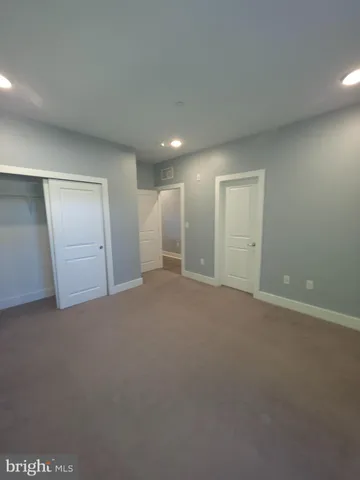 a bathroom with a sink a toilet and bathtub