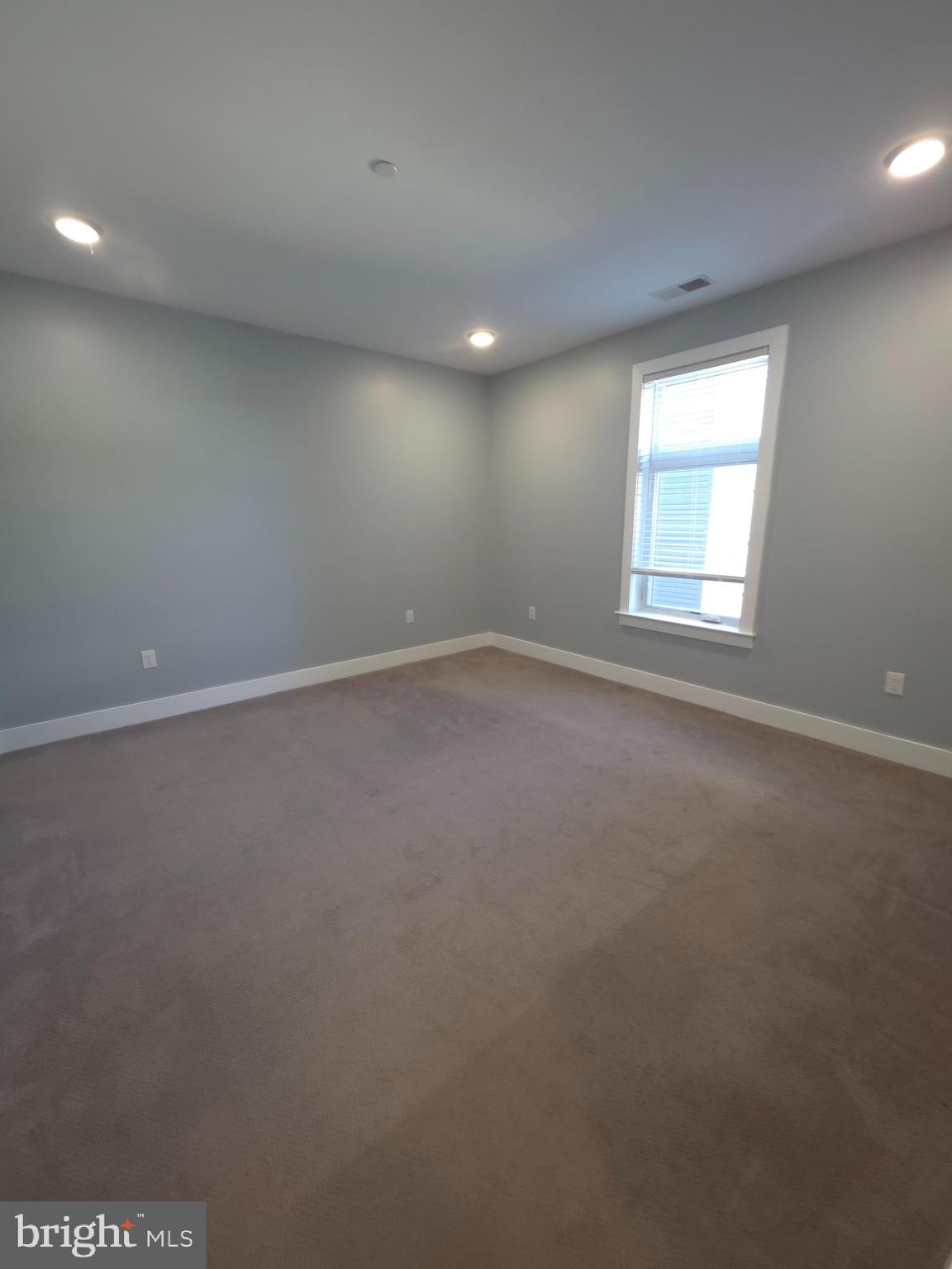 3925 Haverford Avenue, Unit 204 Philadelphia, PA 19104 - Photo 34 of 37 an empty room with a empty space and windows