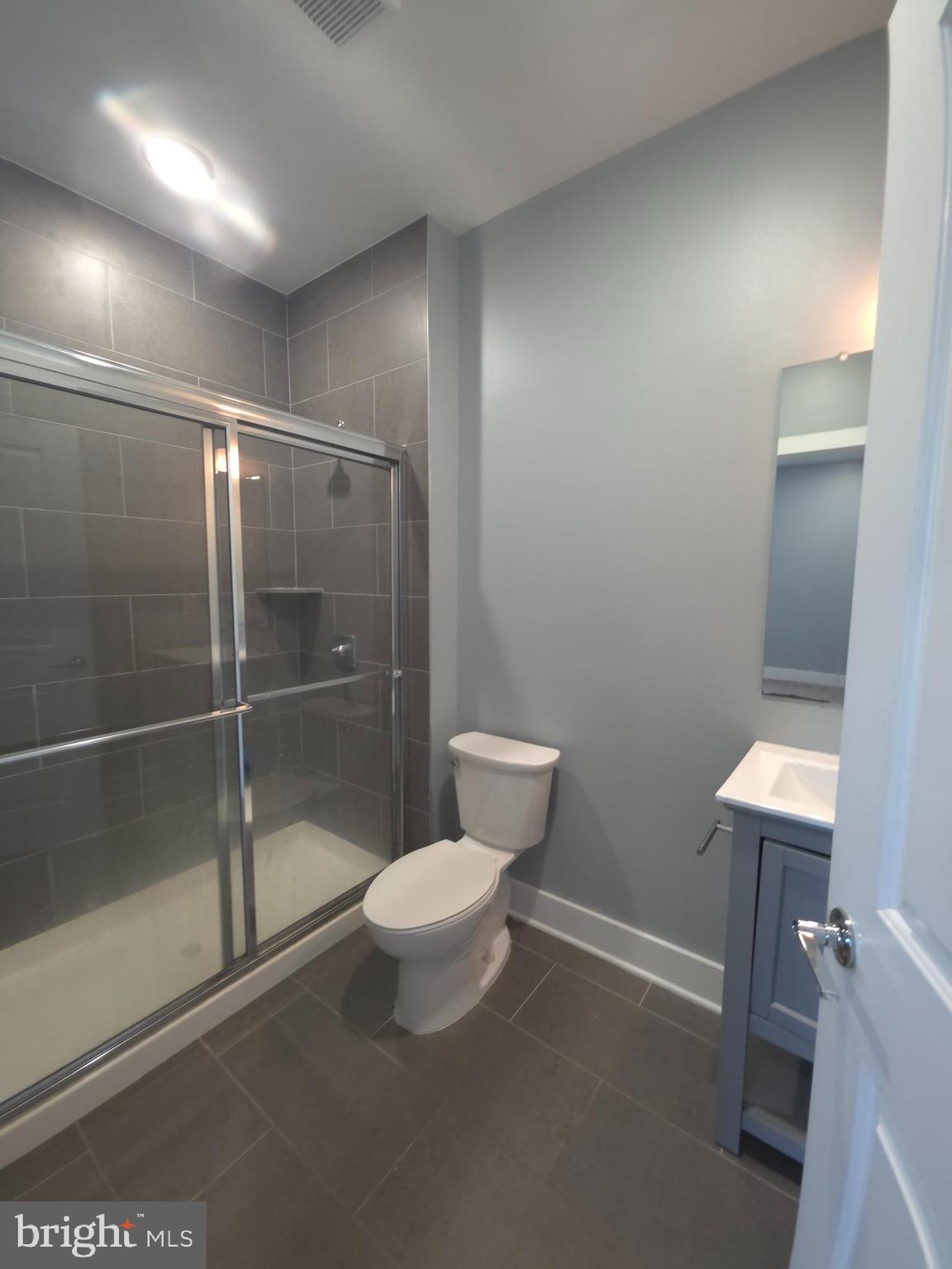 3925 Haverford Avenue, Unit 204 Philadelphia, PA 19104 - Photo 37 of 37 a bathroom with a toilet and a shower