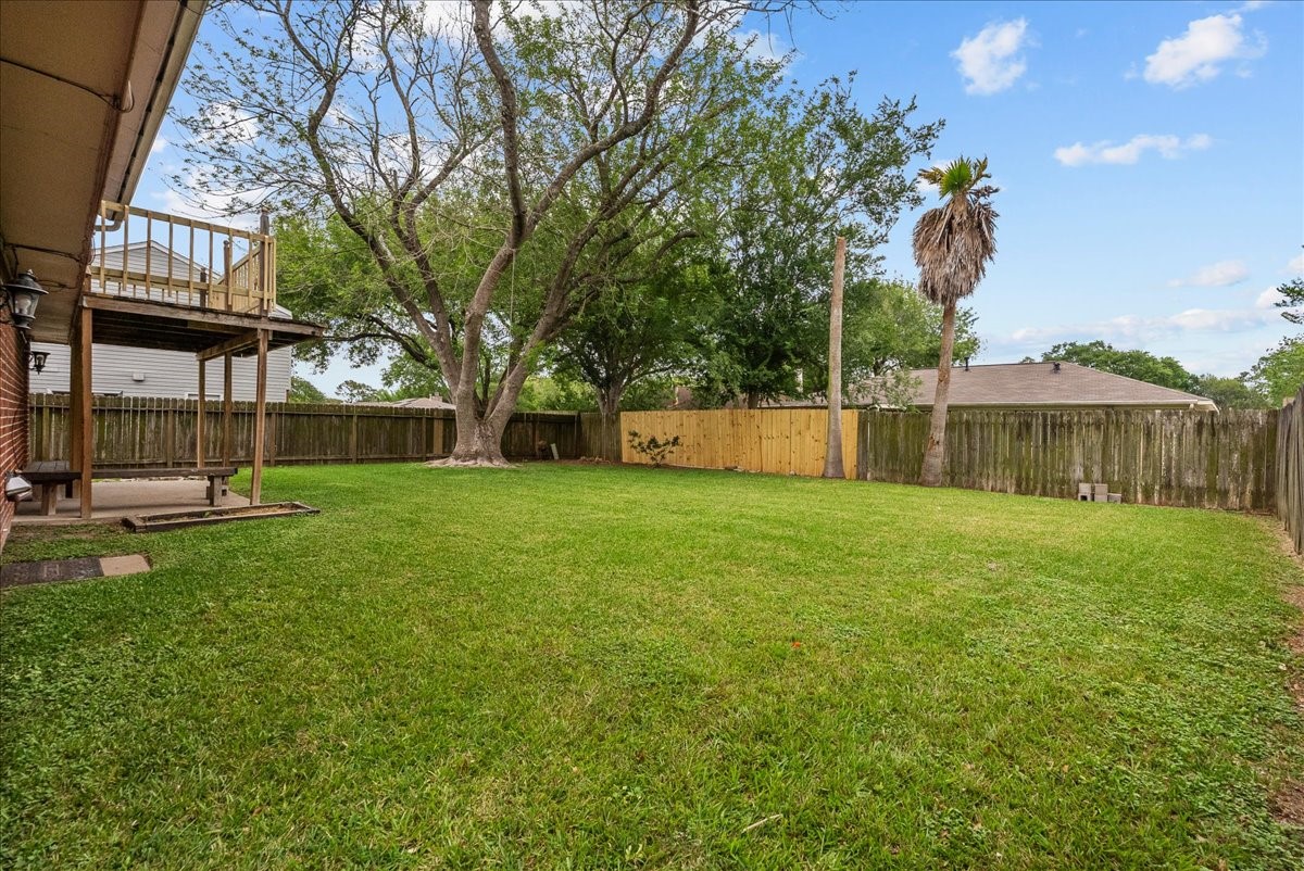 430 Redway Lane Houston, TX 77598 - Photo 39 of 43 a view of a house with backyard and a tree