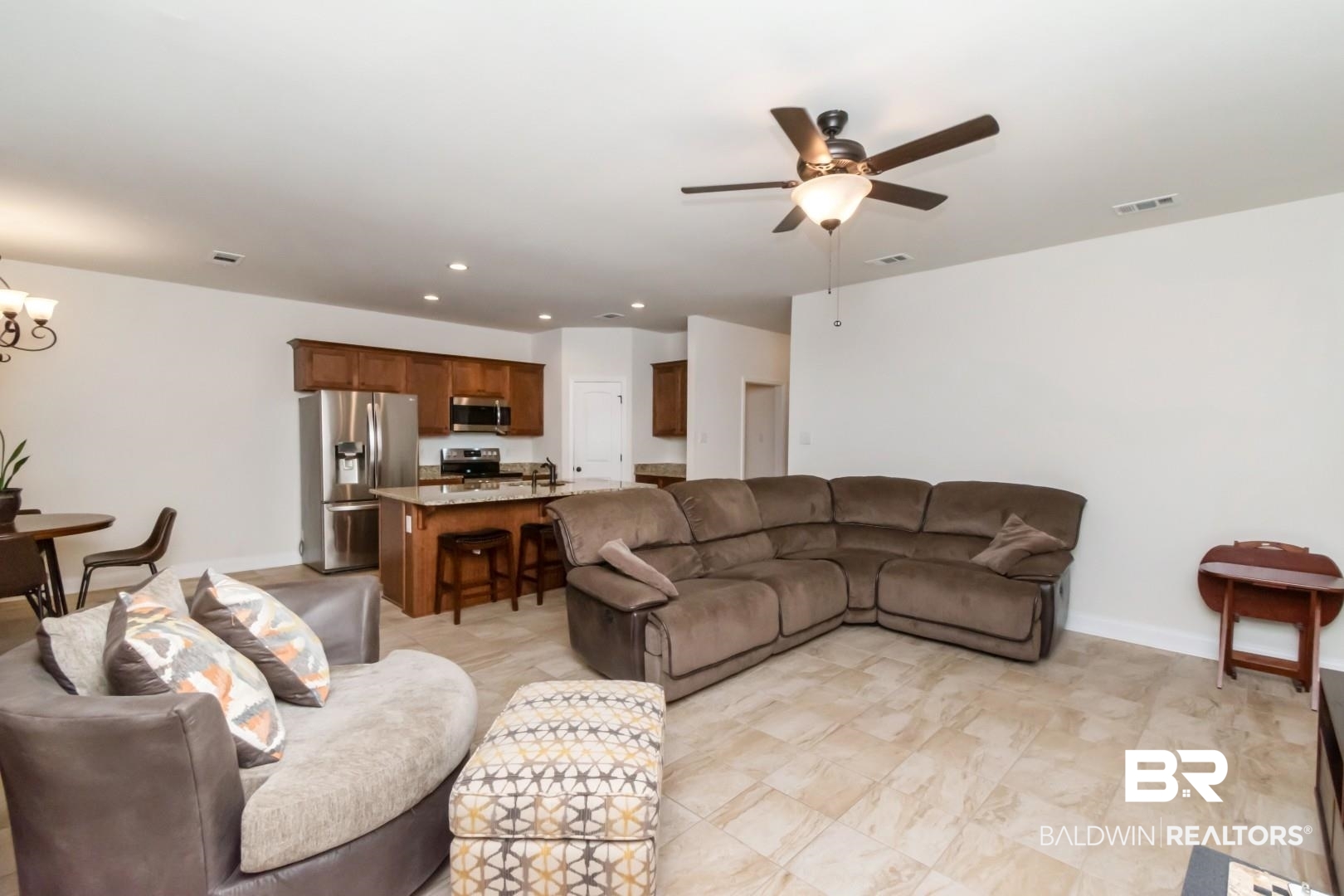 10714 Brodick Loop Spanish Fort, AL 36527 - Photo 10 of 26 Living room featuring ceiling fan, a chandelier, and recessed lighting