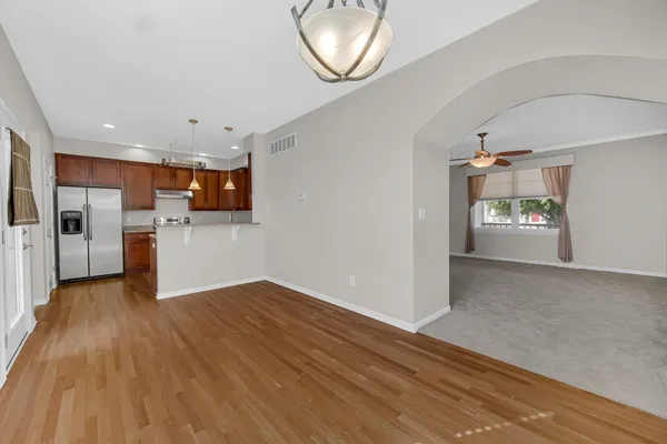 a view of a kitchen with a sink and a microwave