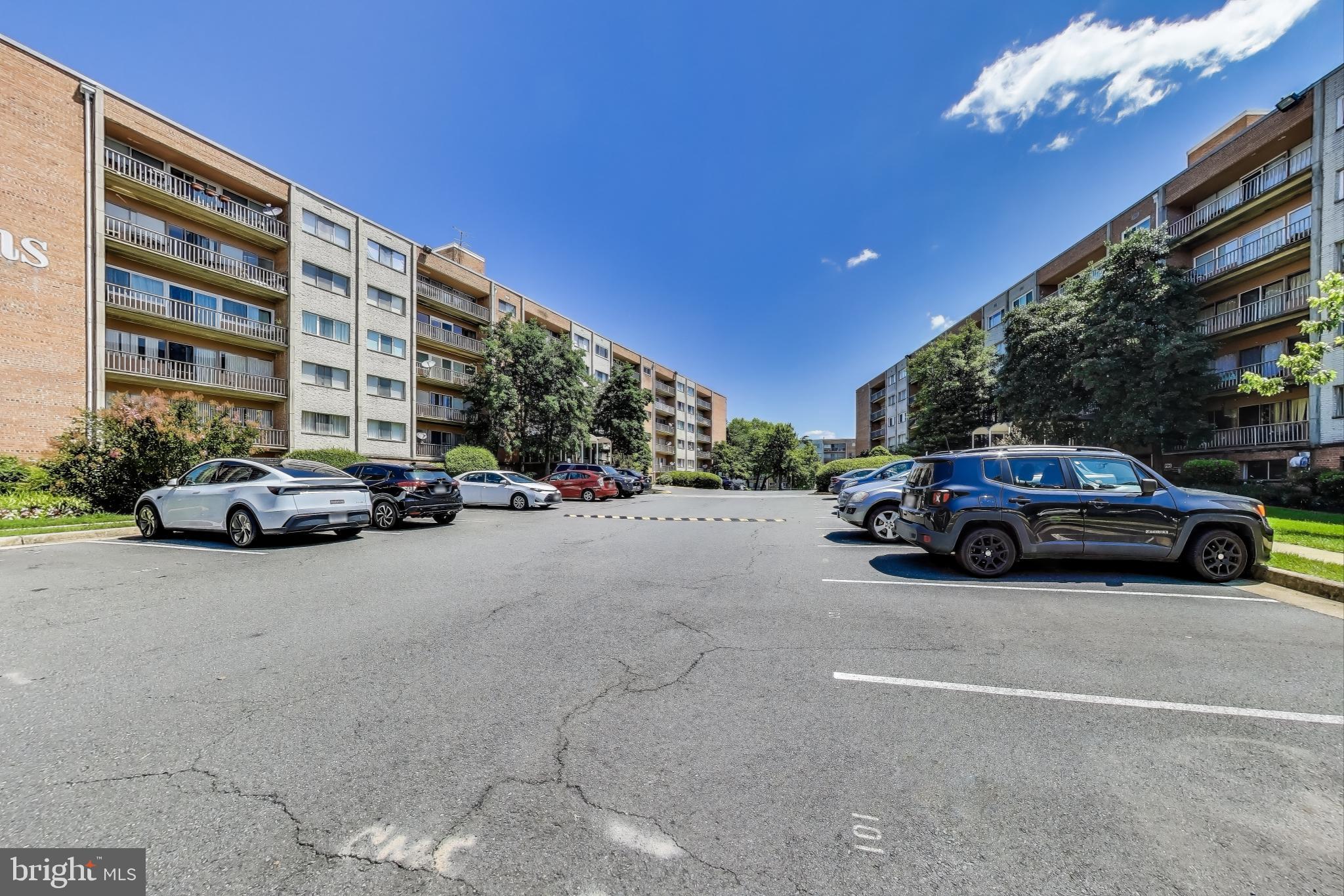 5851 Quantrell Avenue, Unit 407 Alexandria, VA 22312 - Photo 23 of 27 a view of street with parked cars
