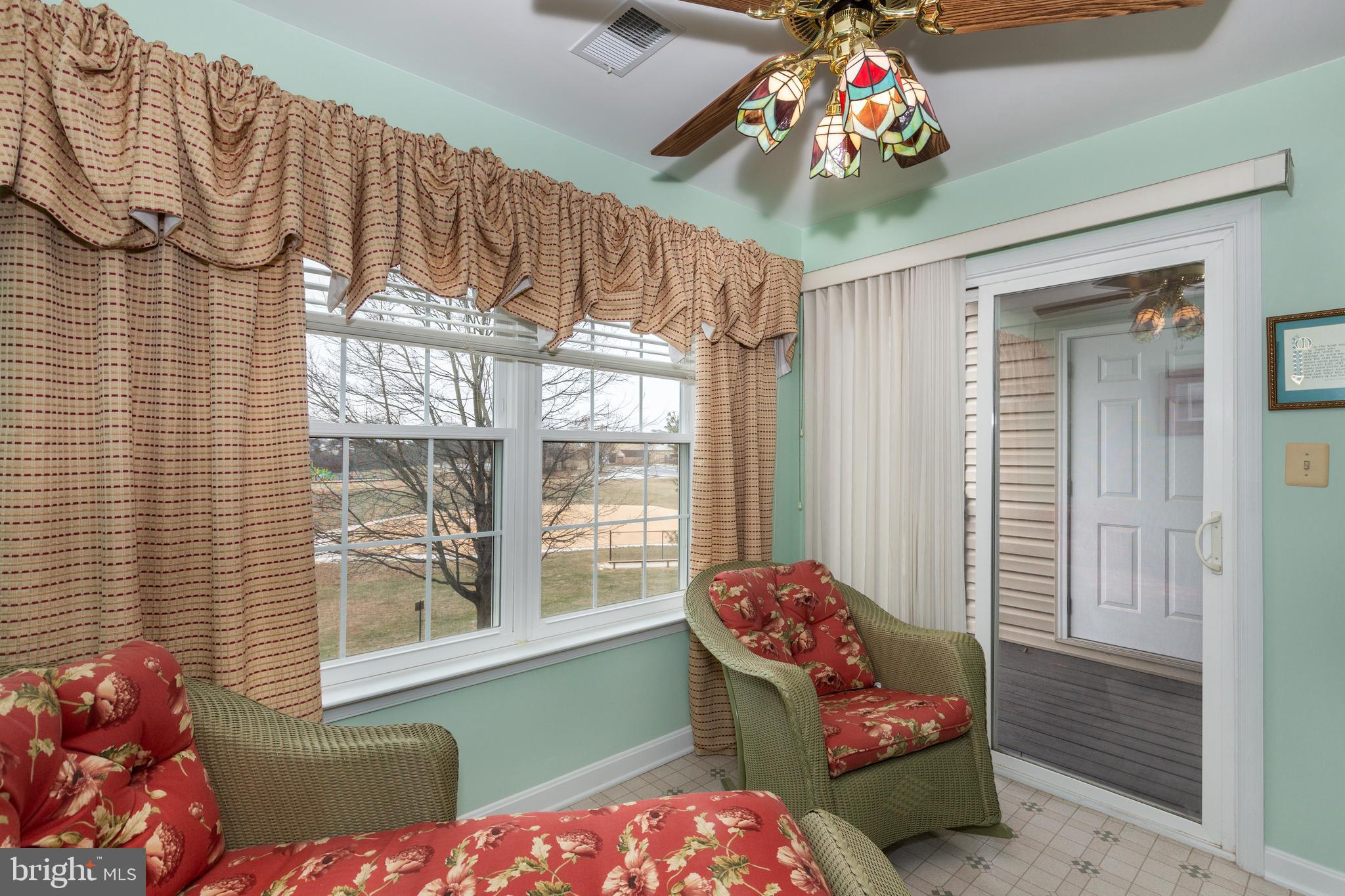 3850 Normandy Drive, Unit 2B Hampstead, MD 21074 - Photo 12 of 26 a bedroom with furniture and a window