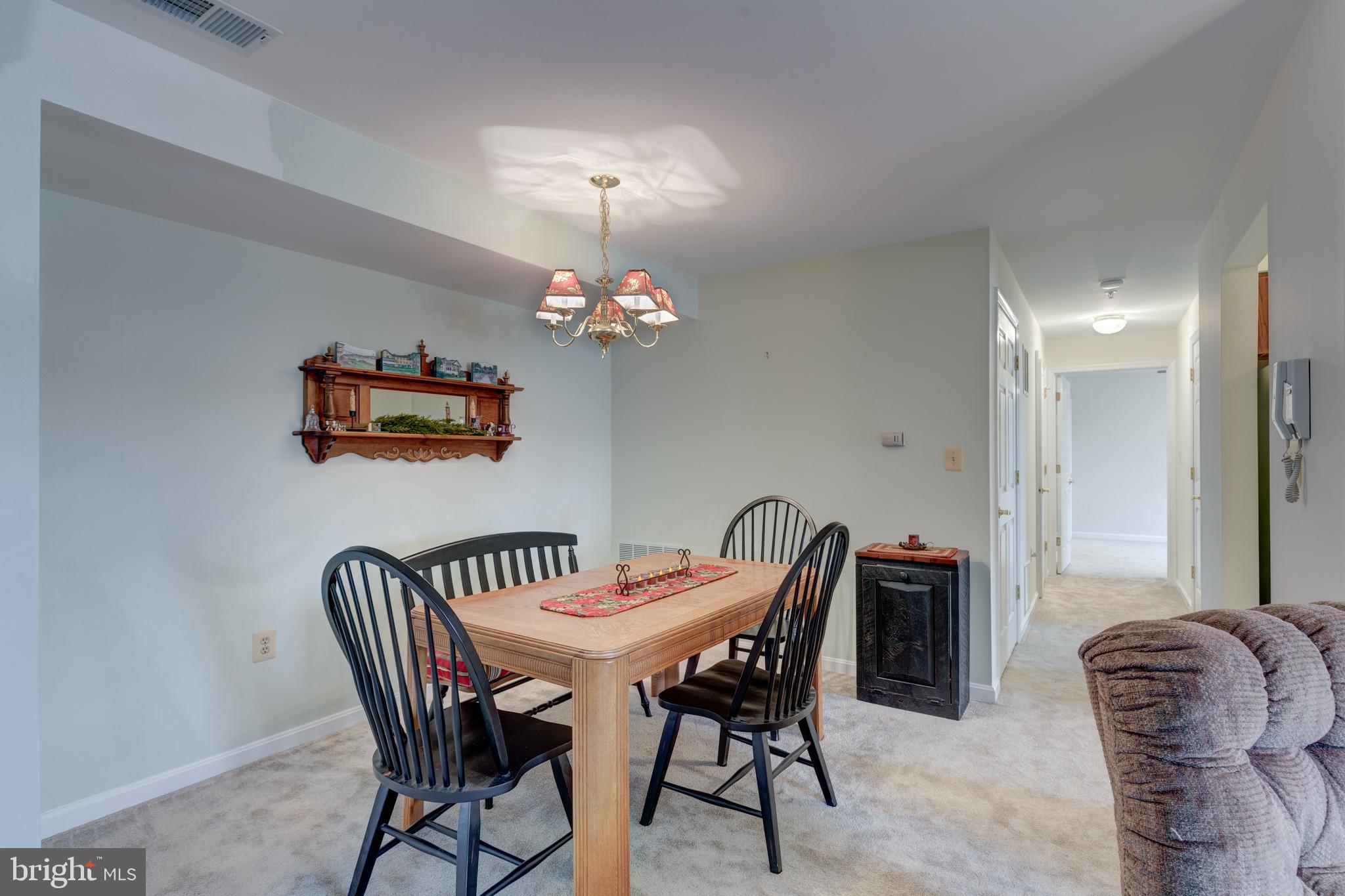 3850 Normandy Drive, Unit 2B Hampstead, MD 21074 - Photo 6 of 26 a view of a dining room with furniture