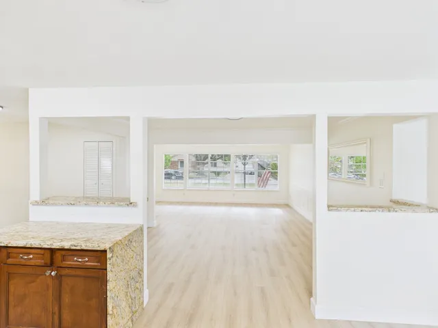 a view of an empty room and window