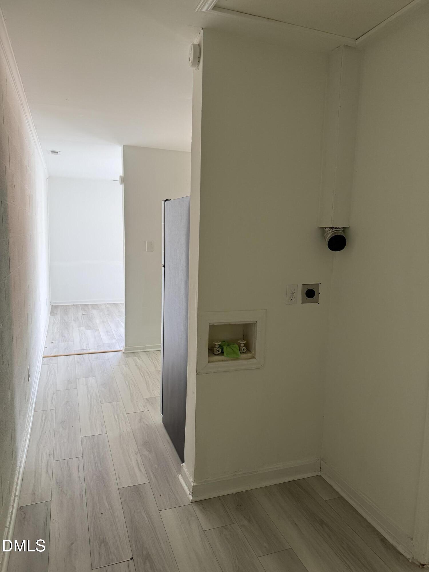 1015 Rosedale Avenue Durham, NC 27707 - Photo 9 of 15 a view of a hallway with wooden floor