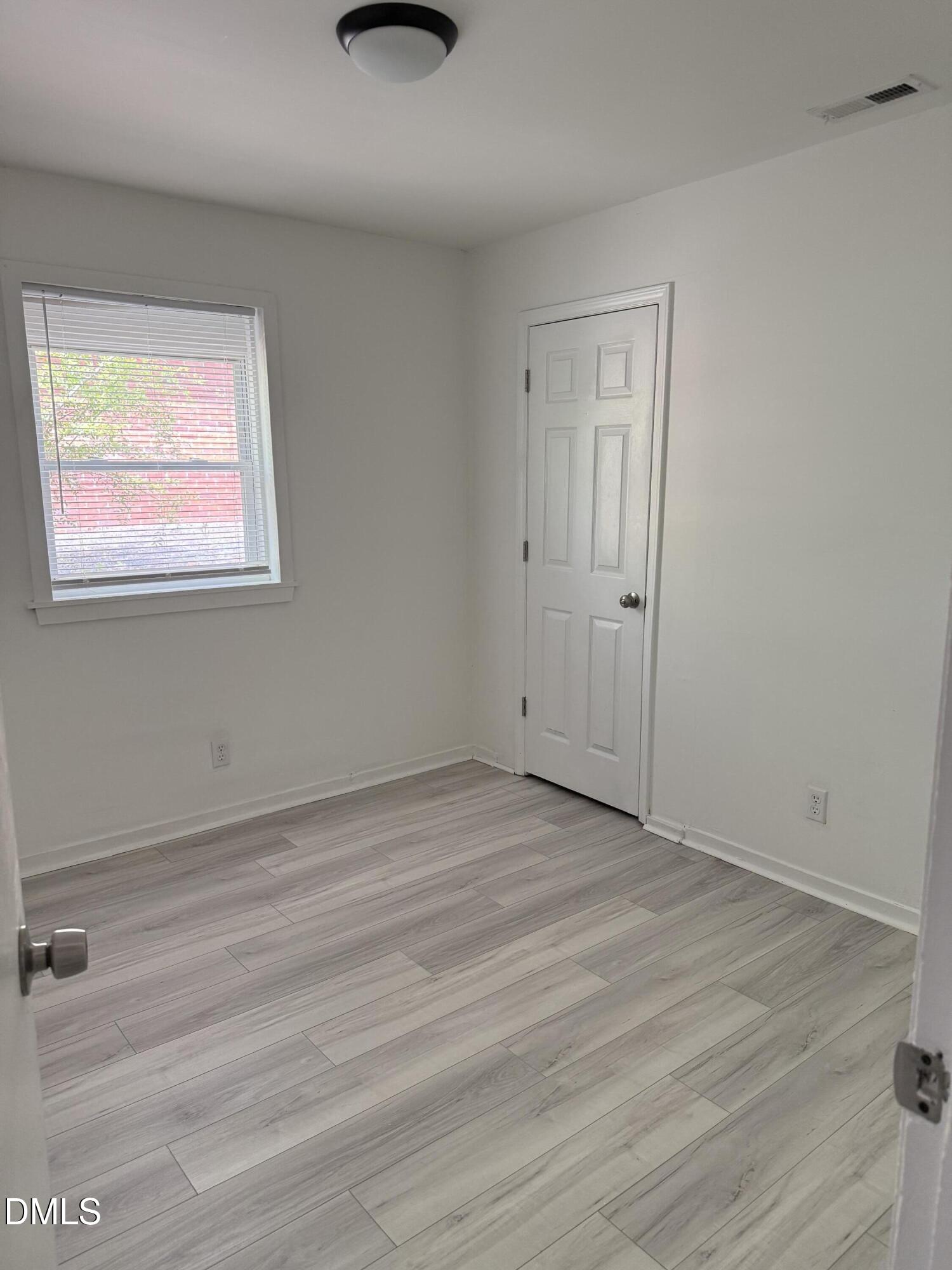 1015 Rosedale Avenue Durham, NC 27707 - Photo 10 of 15 wooden floor in an empty room