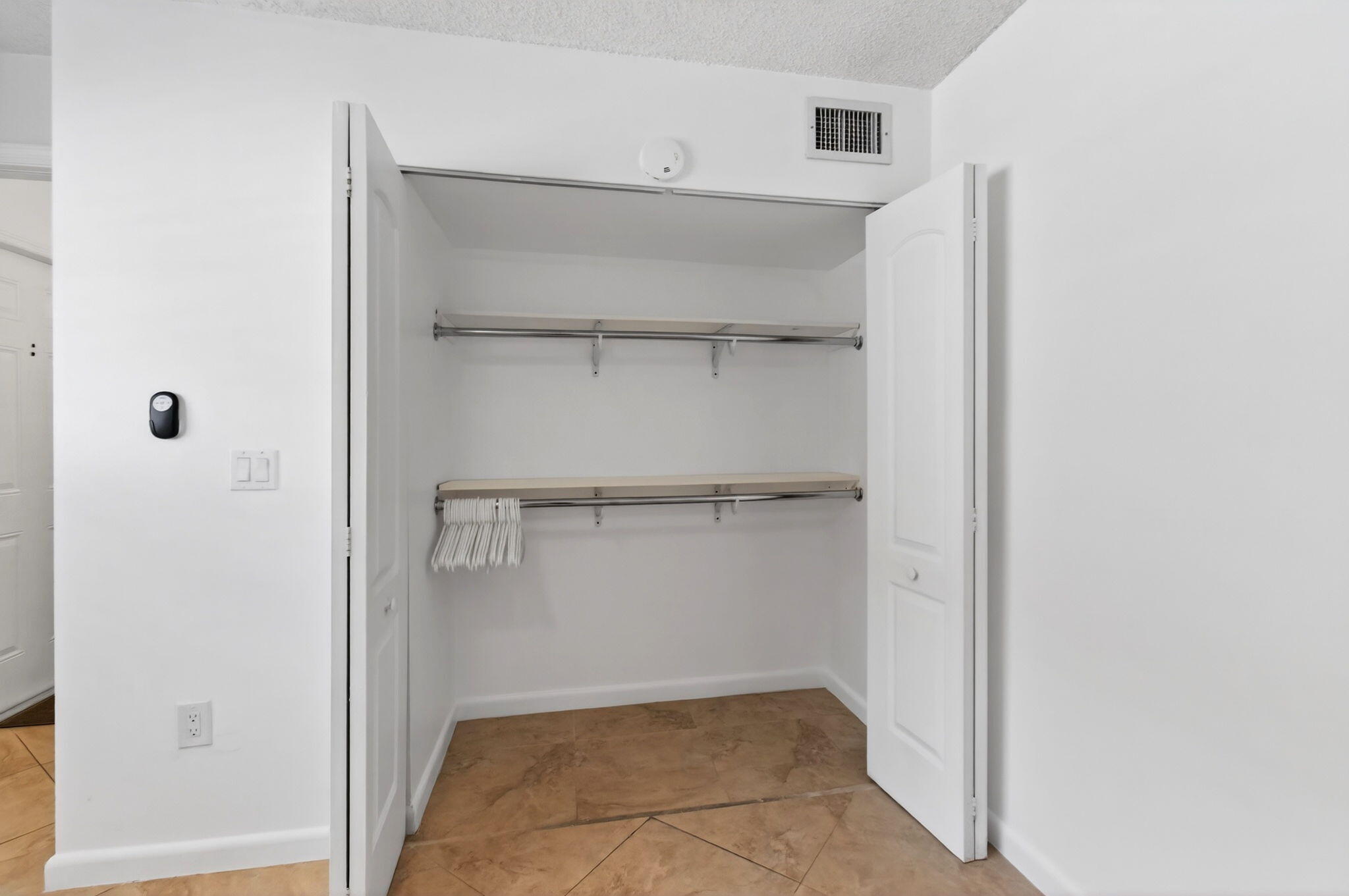 600 Southwest 2nd Avenue, Unit 240 Boca Raton, FL 33432 - Photo 26 of 54 a view of an empty walk in closet