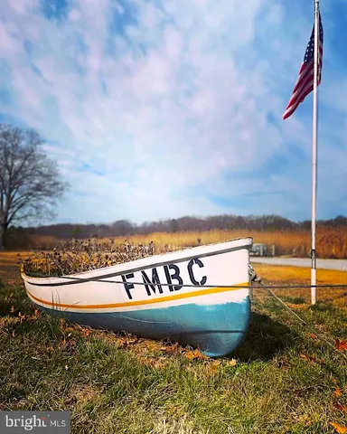 a view of swimming pool with a yard