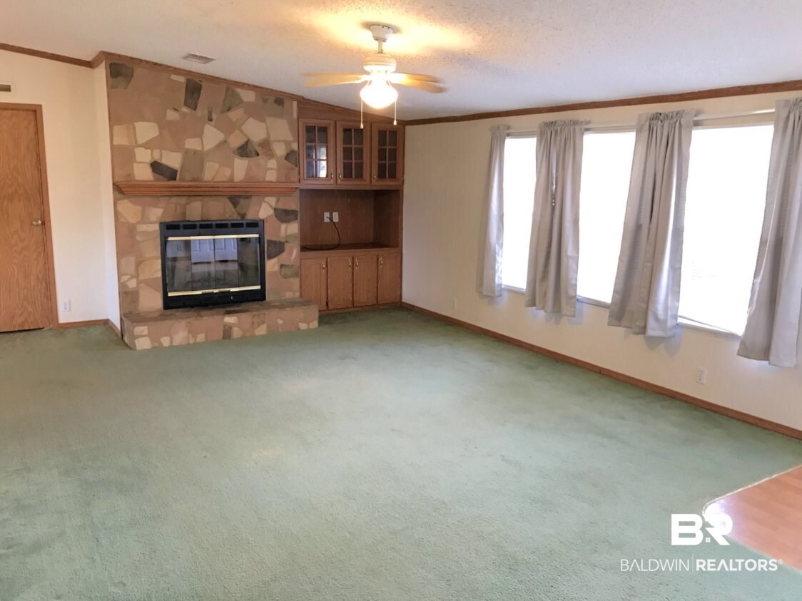 33088 Gilley Road Lillian, AL 36549 - Photo 3 of 11 Living Rm w Fire Place