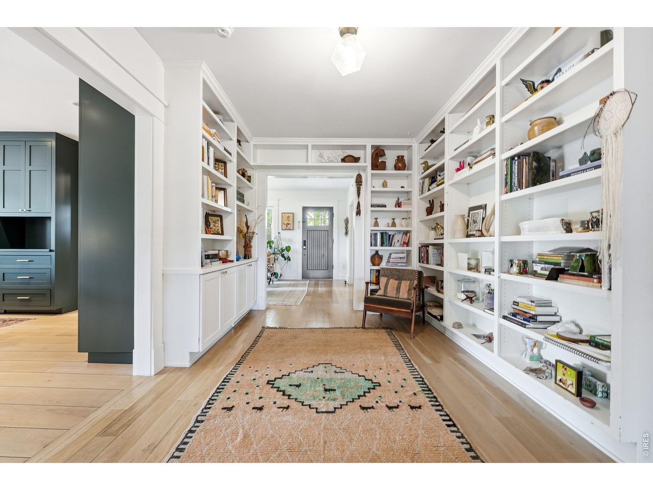 4795 Jay Road Boulder, CO 80301 - Photo 11 of 50 Hallway with built-in book shelves galore.