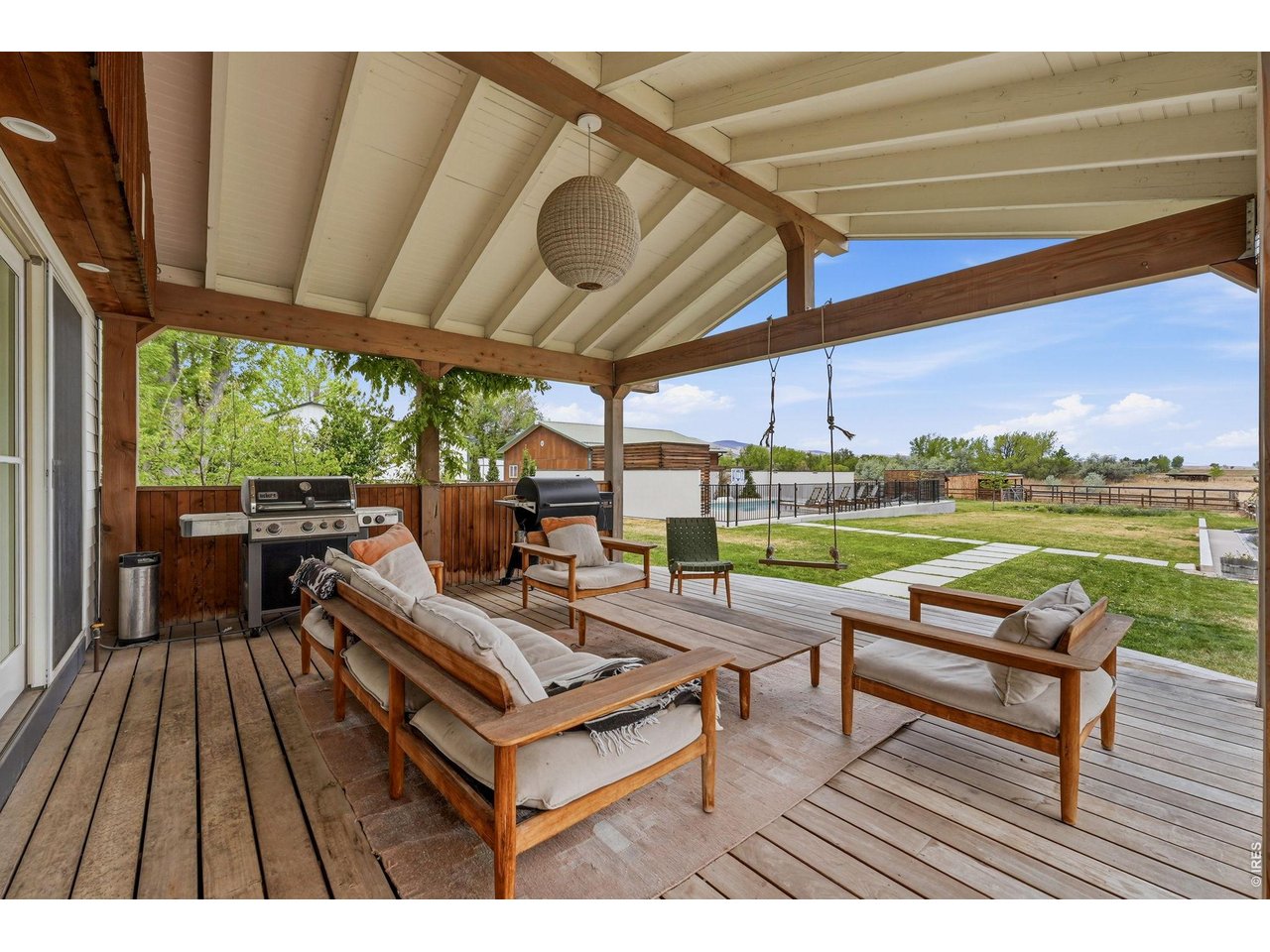 4795 Jay Road Boulder, CO 80301 - Photo 30 of 50 Spacious covered back deck opens to the huge yard and pool.