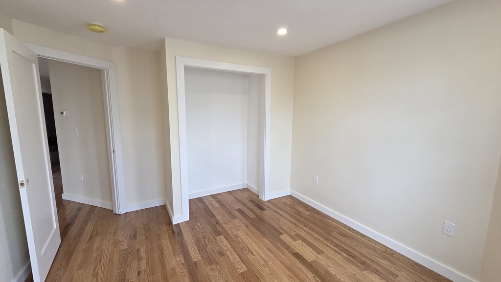 125 Central Avenue, Unit 3 Chelsea, MA 02150 - Photo 2 of 13 a view of a room with wooden floor