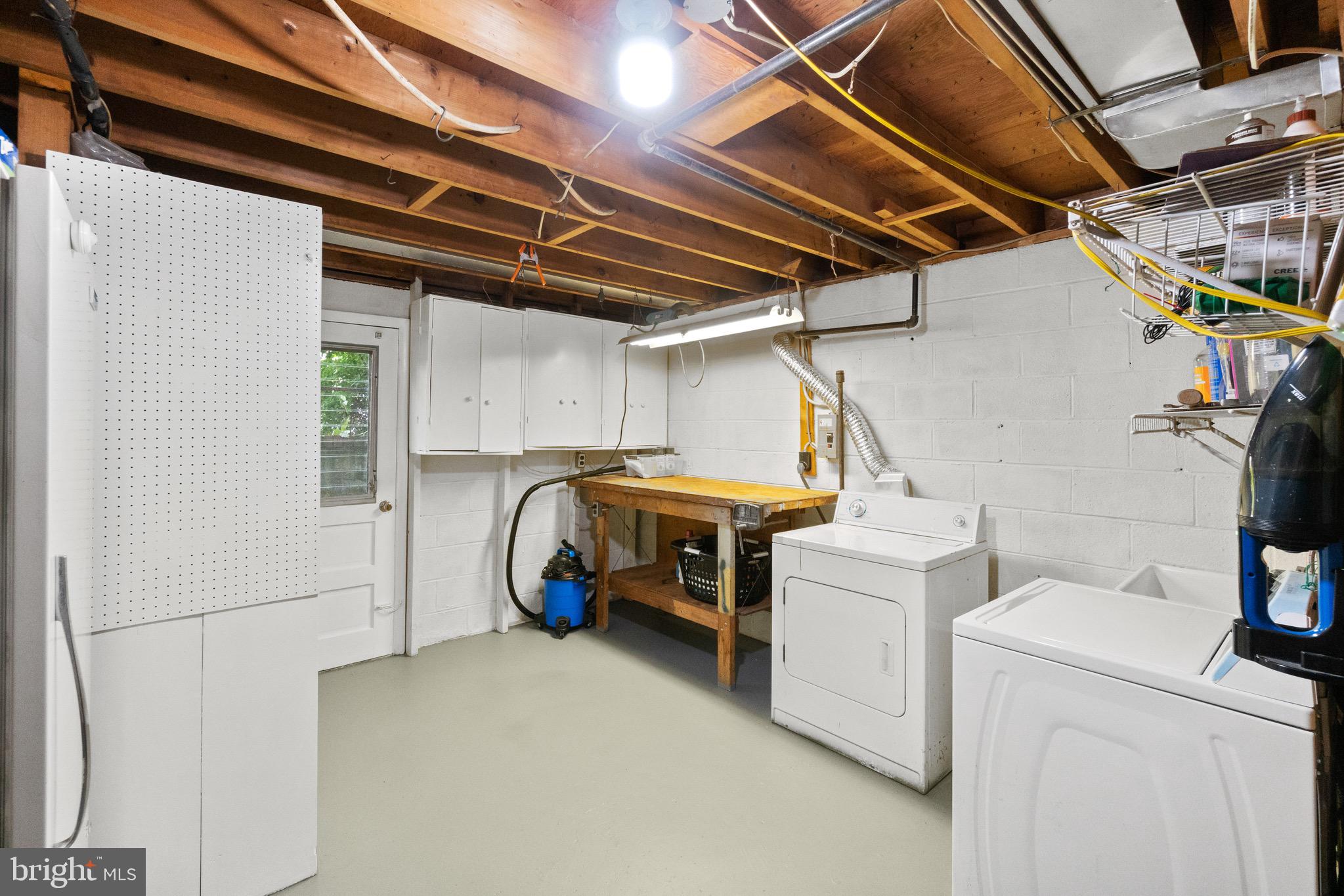 206 Rolling Road Gaithersburg, MD 20877 - Photo 42 of 51 Rm w/washer, dryer, laundry tub & extra fridge