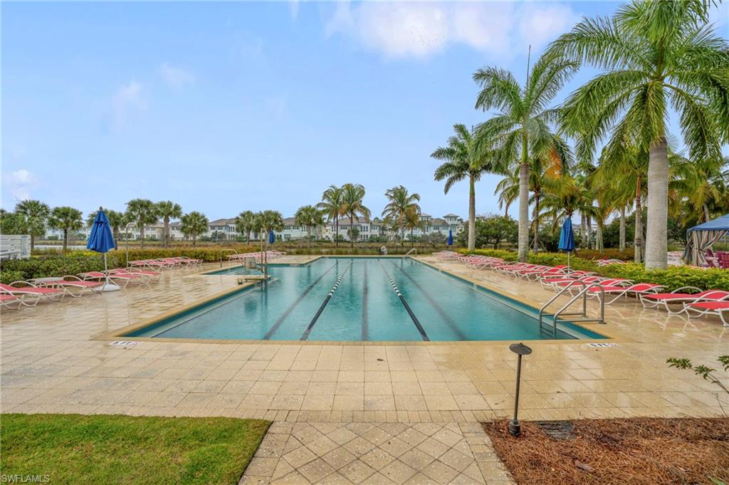 8795 Calypso Court Naples, FL 34113 - Photo 42 of 49 a view of an outdoor space