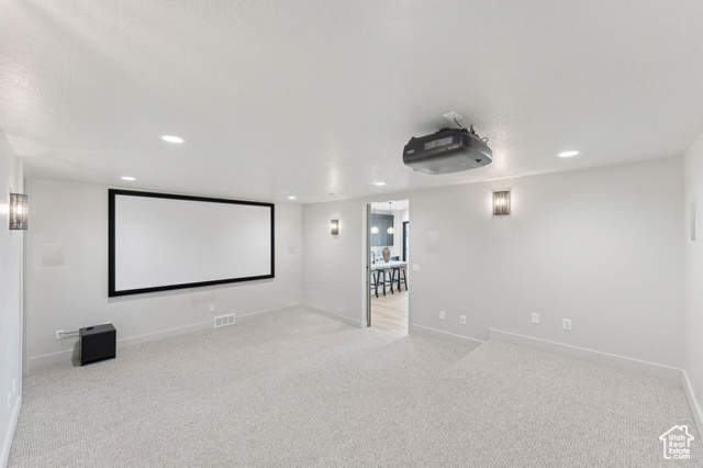 2280 East Outlaw Road, Unit 56 Kamas, UT 84036 - Photo 36 of 59 Home theater room with recessed lighting and carpet floors