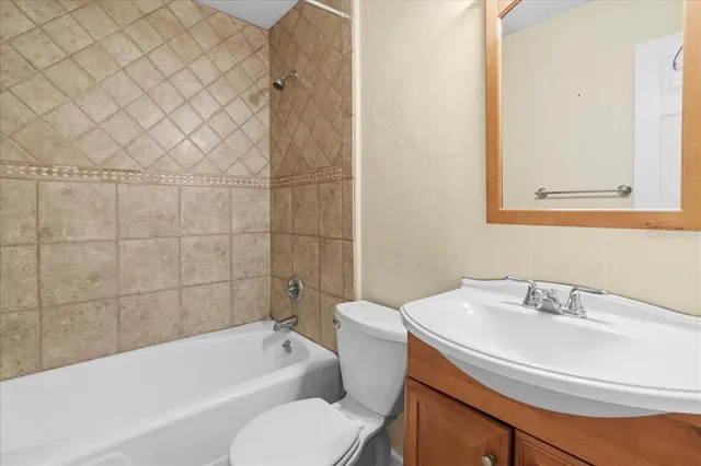 a bathroom with a sink and a bathtub