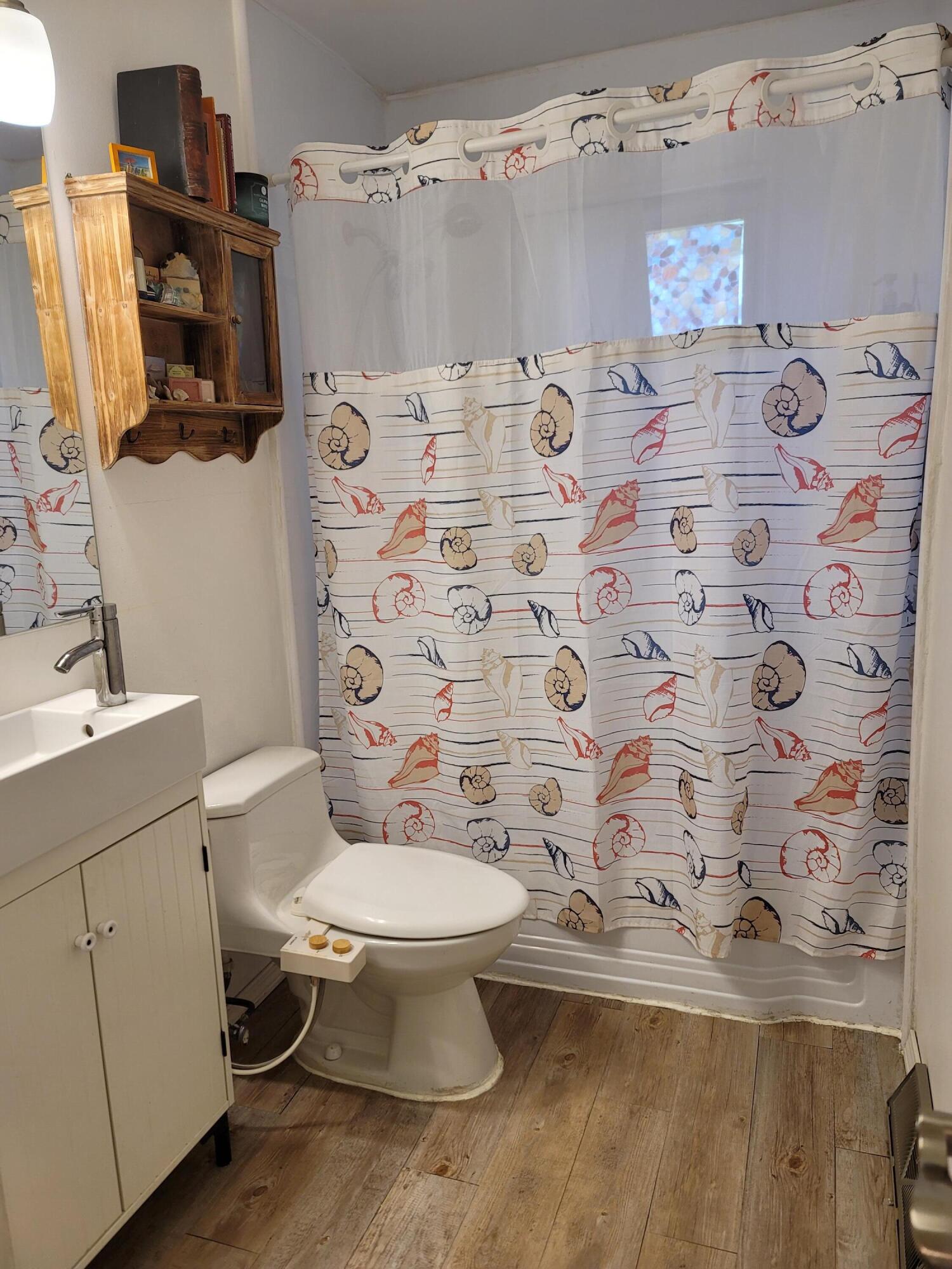 55 Clay Pond Road Monument Beach, MA 02532 - Photo 9 of 15 a bathroom with a sink toilet and shower