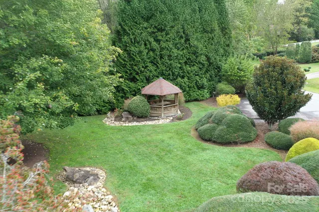 a table and chairs in the garden
